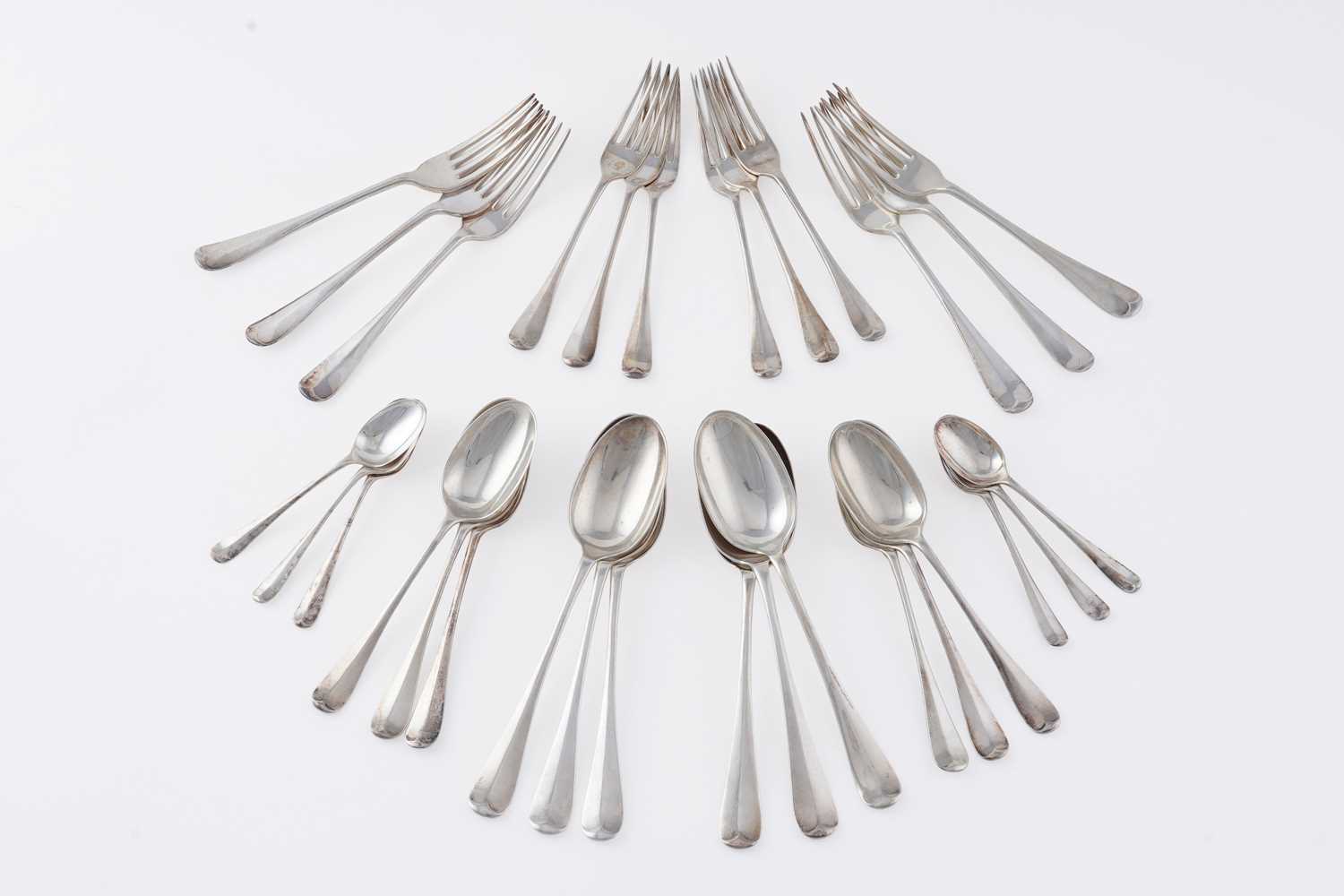 Lot 157 - An Edwardian silver part canteen of flatware