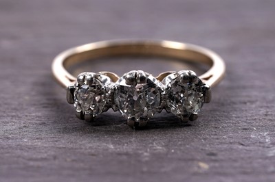 Lot 896 - A three stone diamond ring