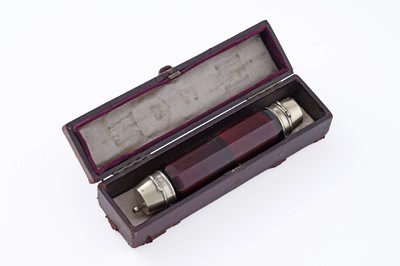 Lot 236 - A Victorian silver gilt mounted red glass double-ended scent bottle