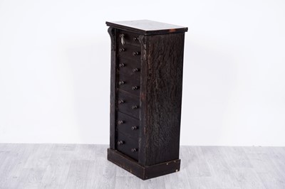 Lot 78 - A Victorian carved and stained oak Wellington chest of drawers