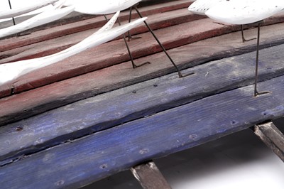 Lot 651 - Max Tannahill - Fishes | sculpture: a wooden shoal of fish and the remnants of a boat hull