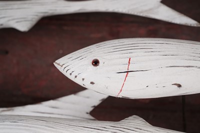 Lot 651 - Max Tannahill - Fishes | sculpture: a wooden shoal of fish and the remnants of a boat hull