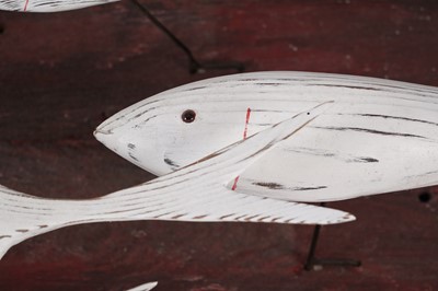 Lot 651 - Max Tannahill - Fishes | sculpture: a wooden shoal of fish and the remnants of a boat hull