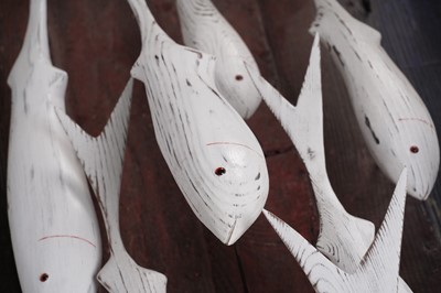 Lot 651 - Max Tannahill - Fishes | sculpture: a wooden shoal of fish and the remnants of a boat hull