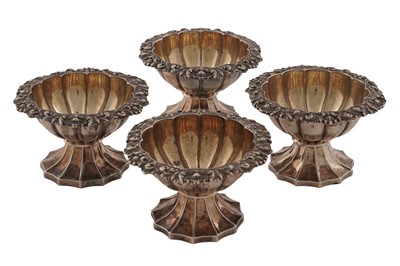 Lot 141 - A set of four George IV silver salts