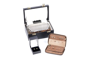 Lot 279 - Two pairs of stud earrings; and an Elizabeth II cased silver brush and comb set