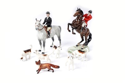 Lot 220 - A collection of eight Beswick hunting ceramic figures