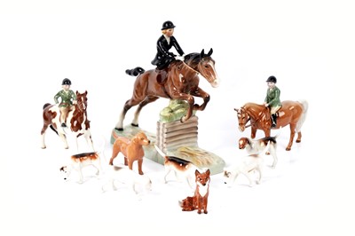 Lot 221 - A collection of ten Beswick ceramic hunting figures