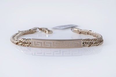 Lot 144 - A contemporary 9ct gold identity style bracelet