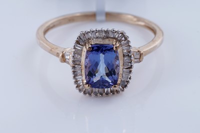 Lot 148 - A contemporary tanzanite and diamond ring