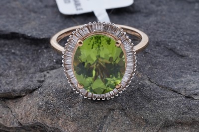 Lot 150 - A contemporary Chinese peridot and diamond ring