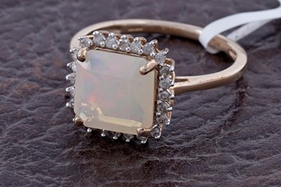 Lot 157 - A contemporary opal and diamond ring