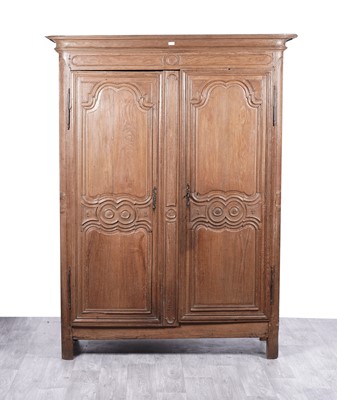 Lot 12 - A 19th Century French Provincial carved oak armoire