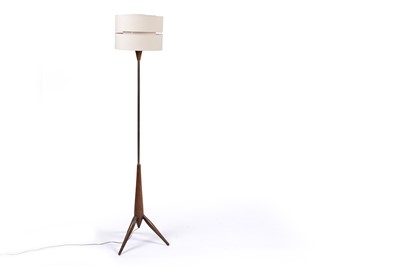 Lot 600 - A teak standard lamp: a 1960’s teak and brass standard lamp
