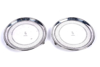 Lot 187 - A pair of George III small silver salvers