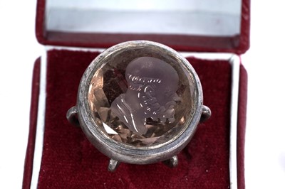 Lot 30 - A 19th Century rose gold and carnelian fob seal with intaglio armorial crest; and further seals