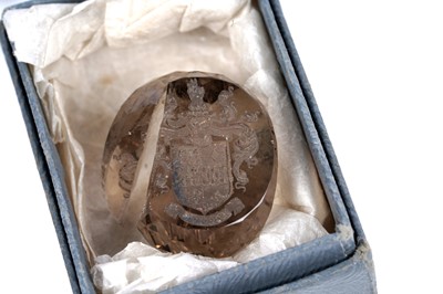 Lot 30 - A 19th Century rose gold and carnelian fob seal with intaglio armorial crest; and further seals