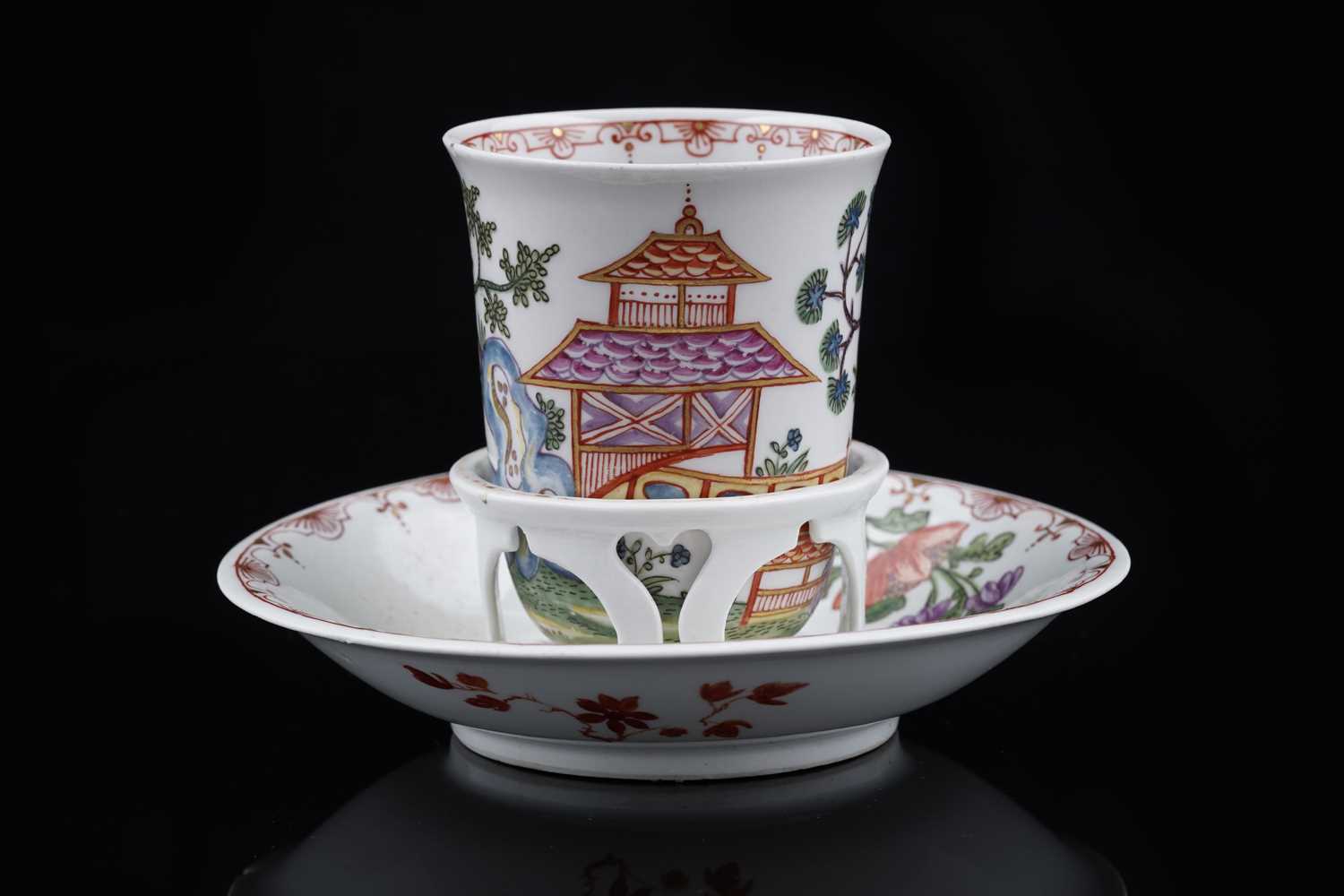 Lot 911 - A Du Paquier beaker and saucer