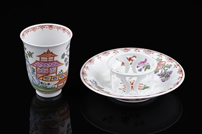Lot 911 - A Du Paquier beaker and saucer