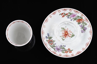 Lot 911 - A Du Paquier beaker and saucer