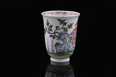 Lot 911 - A Du Paquier beaker and saucer