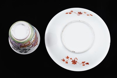 Lot 911 - A Du Paquier beaker and saucer