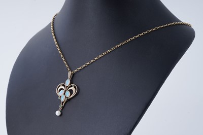 Lot 12 - An Edwardian Art Nouveau style opal, emerald, and pearl pendant necklace