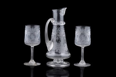 Lot 943 - A Continental wine jug and glasses