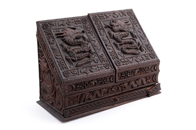 Lot 139 - An early 20th Century Chinese carved desk top stationary box