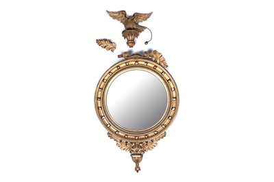 Lot 230 - A 19th Century gilt wood convex mirror