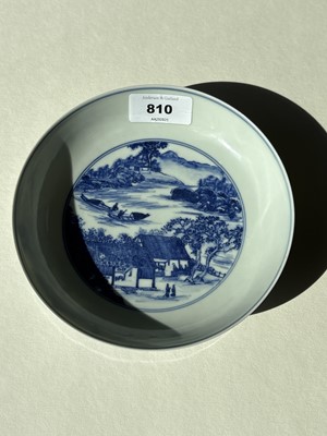 Lot 810 - A Chinese blue and white saucer dish; and a Canton enamel dish