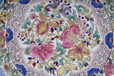 Lot 810 - A Chinese blue and white saucer dish; and a Canton enamel dish