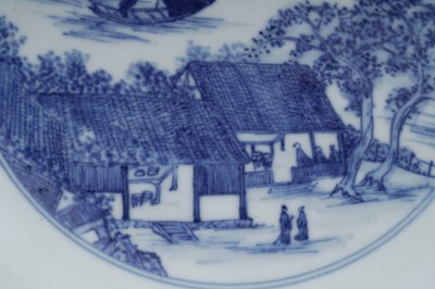 Lot 810 - A Chinese blue and white saucer dish; and a Canton enamel dish