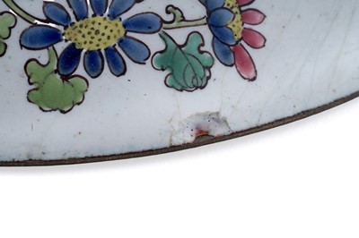 Lot 810 - A Chinese blue and white saucer dish; and a Canton enamel dish