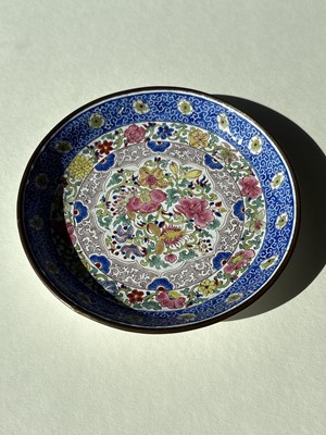 Lot 810 - A Chinese blue and white saucer dish; and a Canton enamel dish