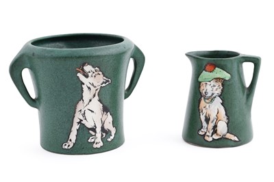 Lot 203 - An Art Deco pottery cream jug and twin handled vase