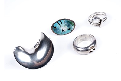 Lot 89 - A Georg Jensen Modernist silver ring designed by Hans Hansen; and others similar