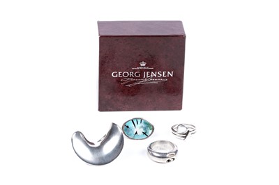 Lot 89 - A Georg Jensen Modernist silver ring designed by Hans Hansen; and others similar