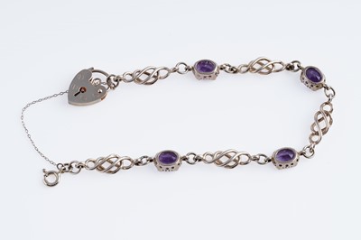 Lot 18 - An edwardian style amethyst and 9ct gold bracelet