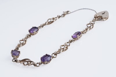 Lot 18 - An edwardian style amethyst and 9ct gold bracelet