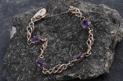 Lot 18 - An edwardian style amethyst and 9ct gold bracelet