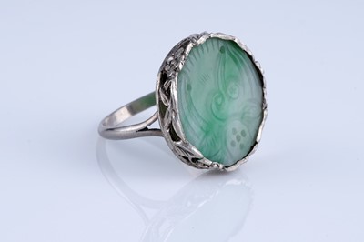 Lot 21 - A 1920s Chinese jade and silver ring