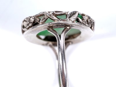 Lot 21 - A 1920s Chinese jade and silver ring