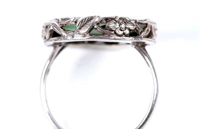 Lot 21 - A 1920s Chinese jade and silver ring
