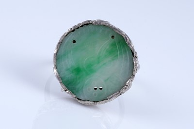 Lot 21 - A 1920s Chinese jade and silver ring