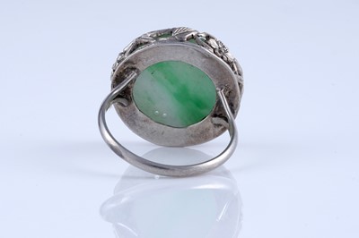 Lot 21 - A 1920s Chinese jade and silver ring