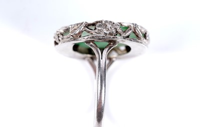 Lot 21 - A 1920s Chinese jade and silver ring