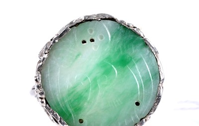 Lot 21 - A 1920s Chinese jade and silver ring