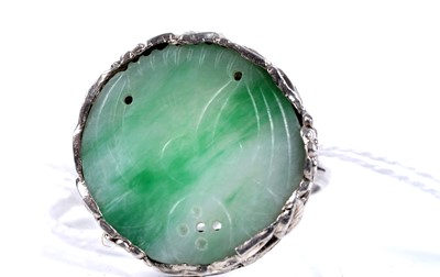 Lot 21 - A 1920s Chinese jade and silver ring