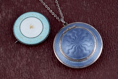 Lot 35 - A 1920's Swiss guilloche enamelled silver powder compact; and a brooch